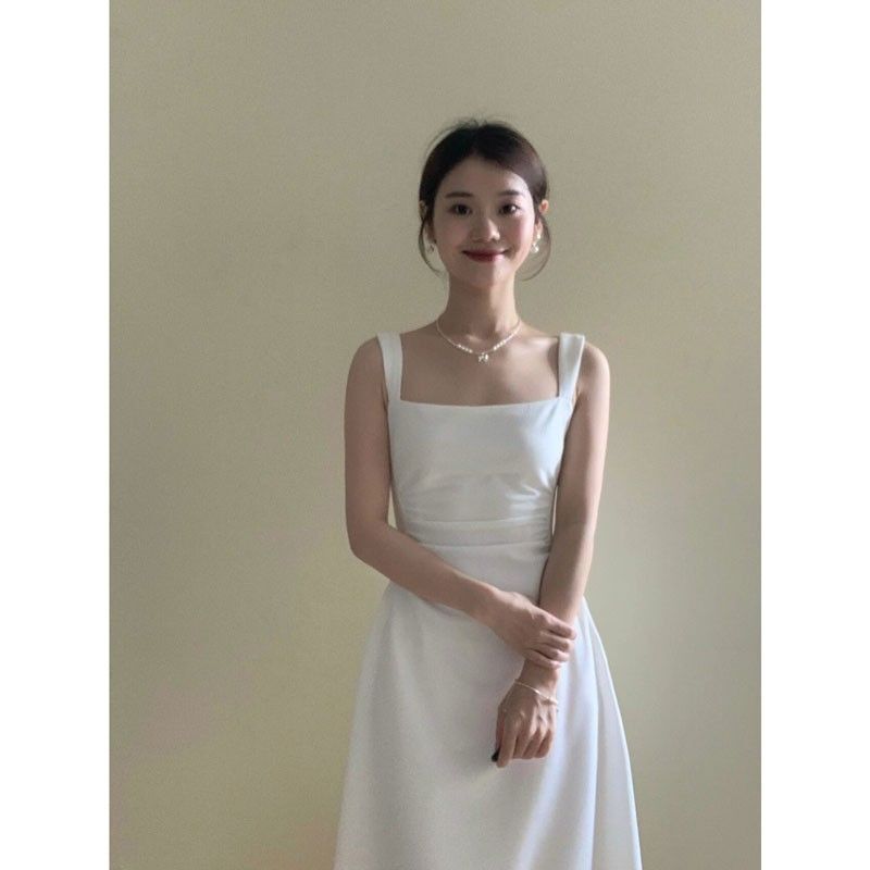 茶歇法式纯欲气质收腰修身显瘦方领白色吊带连衣裙女温柔风长裙子