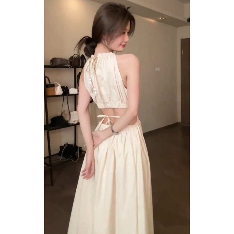 设计感法式小众镂空无袖挂脖吊带连衣裙露背系带温柔风气质长裙子 设计感法式小众镂空无袖挂脖吊带连衣裙露背系带温柔风气质长裙子