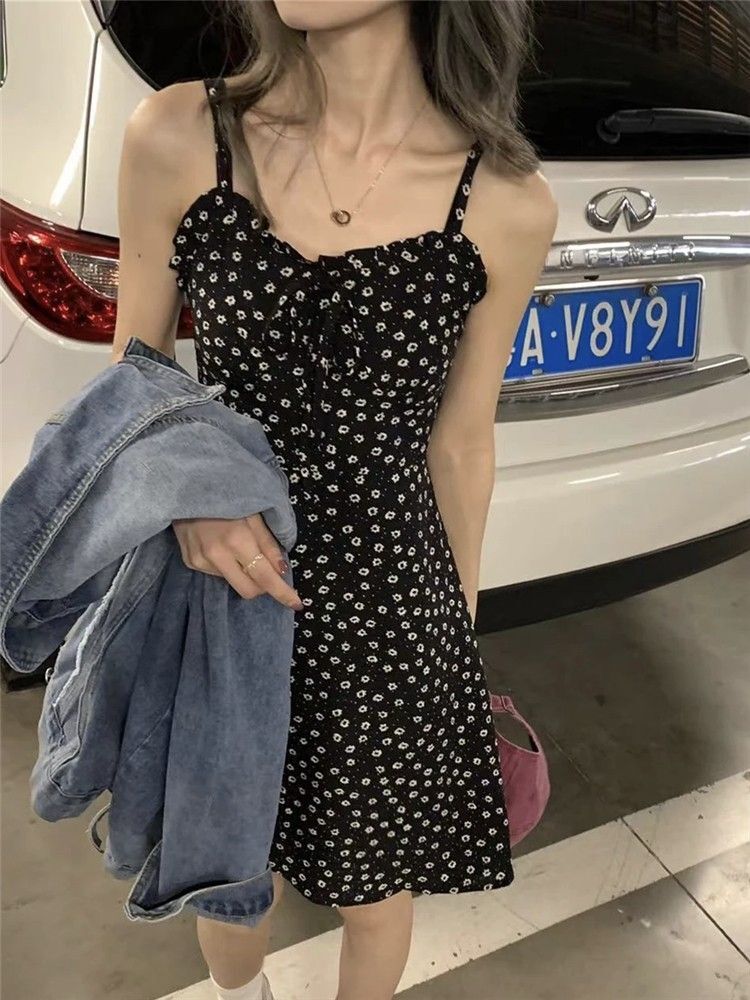 法式小众收腰茶歇连衣裙辣妹性感打结海边度假纯欲吊带印花滩裙裙