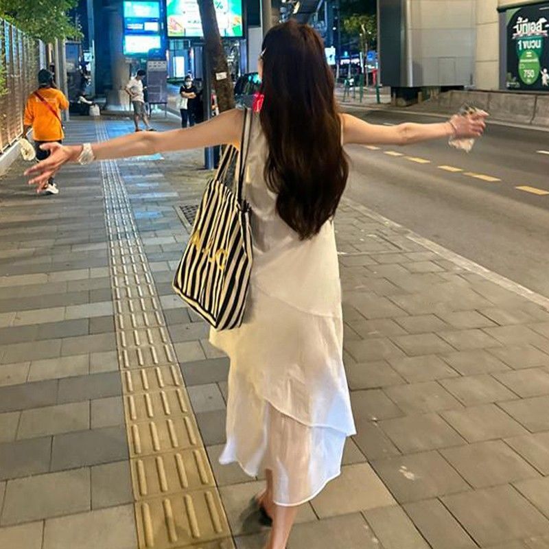 白色背心裙女夏季2025新款法式宽松设计感中长款不规则吊带连