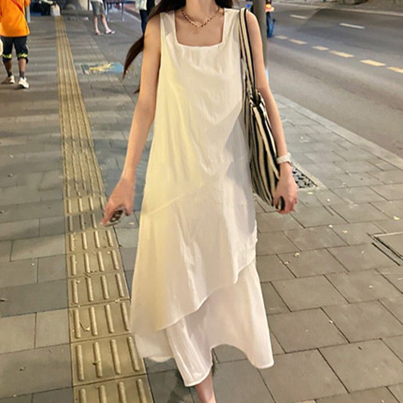 白色背心裙女夏季2025新款法式宽松设计感中长款不规则吊带连