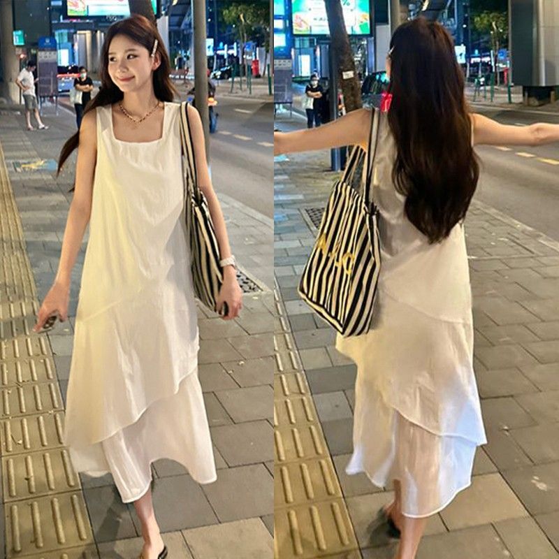 白色背心裙女夏季2025新款法式宽松设计感中长款不规则吊带连