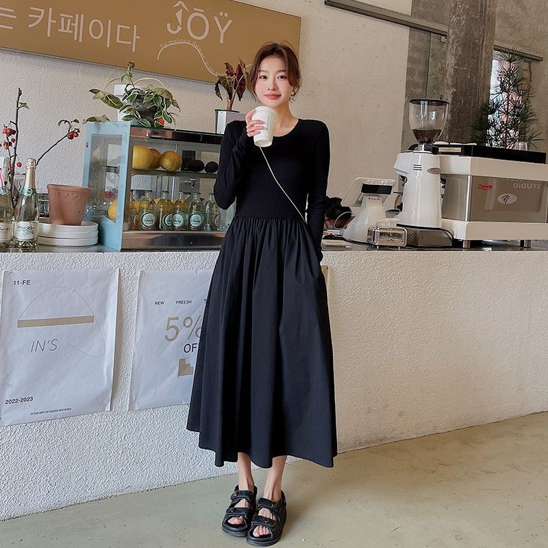 黑色拼接连衣裙女秋季2024新款法式高腰显瘦设计感镂空长袖a